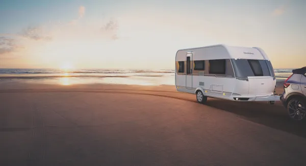 rental caravan family on a beach